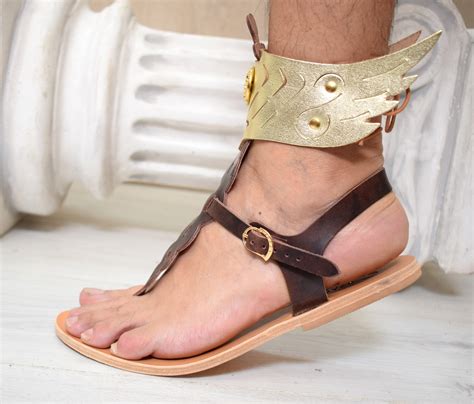 picture of biblical hermes putting sandal on|how was Hermes worshipped.